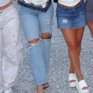 Distressed Light Blue woman’s Levi’s Jeans